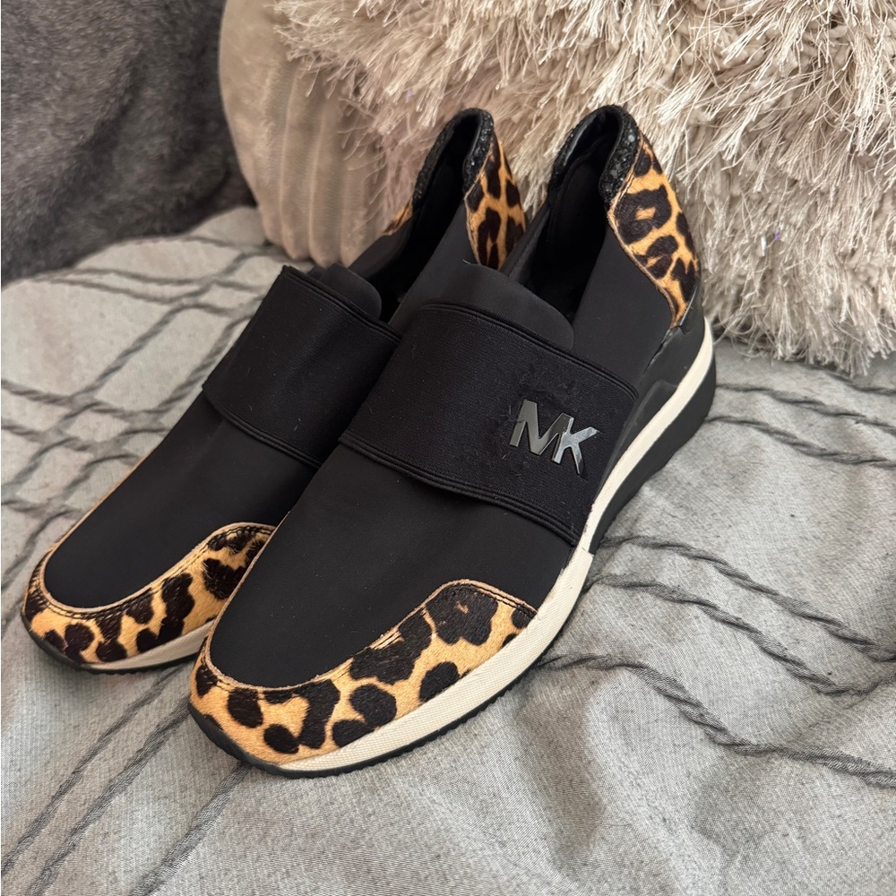 Michael Kors’s black leopard print slip on sneakers, glitter, size 8.5